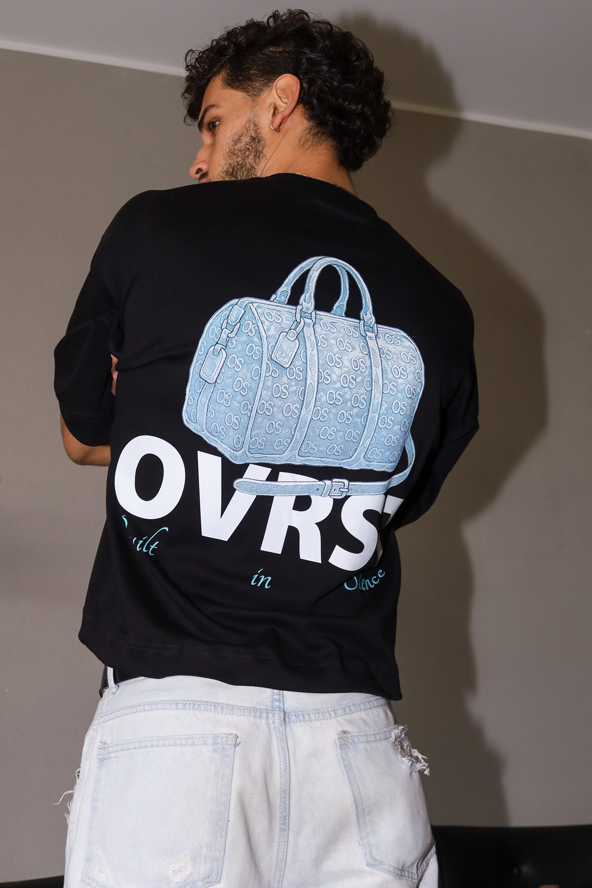 Polera OVRST Bolso
